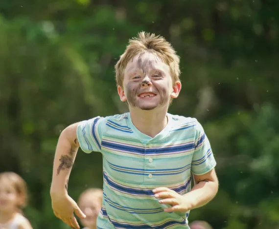 Boy running in summer