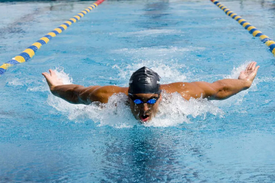 Man Swimming in pool